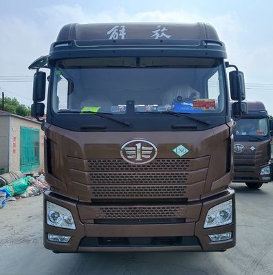 Dirección hidráulica de segunda mano Jh6 Camión de transporte 6X4/8X4 10/12 Cabeza de remolque de ruedas