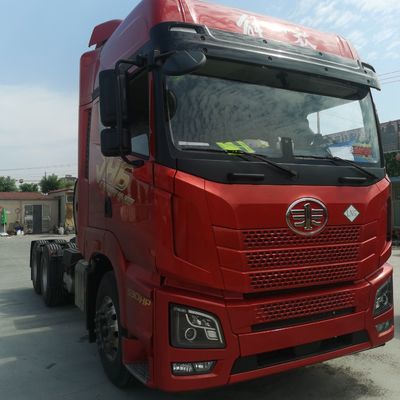 Caja de carga de acero al carbono FAW Jh6 LNG camión tractor de 530 CV con asiento de suspensión aérea