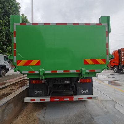 Camión de basura asistido por motor con chasis Sinotruk Shacman y cabina de aire acondicionado
