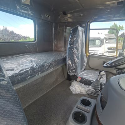 Restituciones de devoluciones Caja de carga de acero al carbono gasolina HOWO camión tractor con tanque de combustible de 1000L