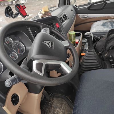 Camión tractor Sinotruk de segunda mano con caja de carga de acero al carbono en buenas condiciones