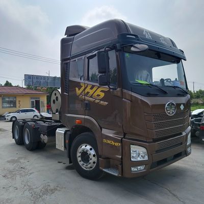 Dirección hidráulica de segunda mano Jh6 Camión de transporte 6X4/8X4 10/12 Cabeza de remolque de ruedas
