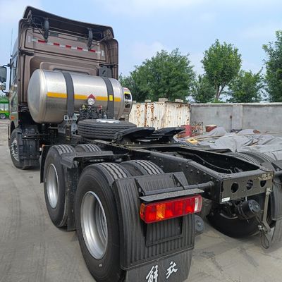 Dirección hidráulica de segunda mano Jh6 Camión de transporte 6X4/8X4 10/12 Cabeza de remolque de ruedas